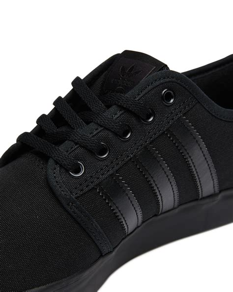 adidas all black men's shoes.